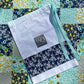 Springtime Handmade Baby Quilt, Patchwork Baby Blanket  (36"x45)  Navy and Aqua Florals - Ready to Ship!